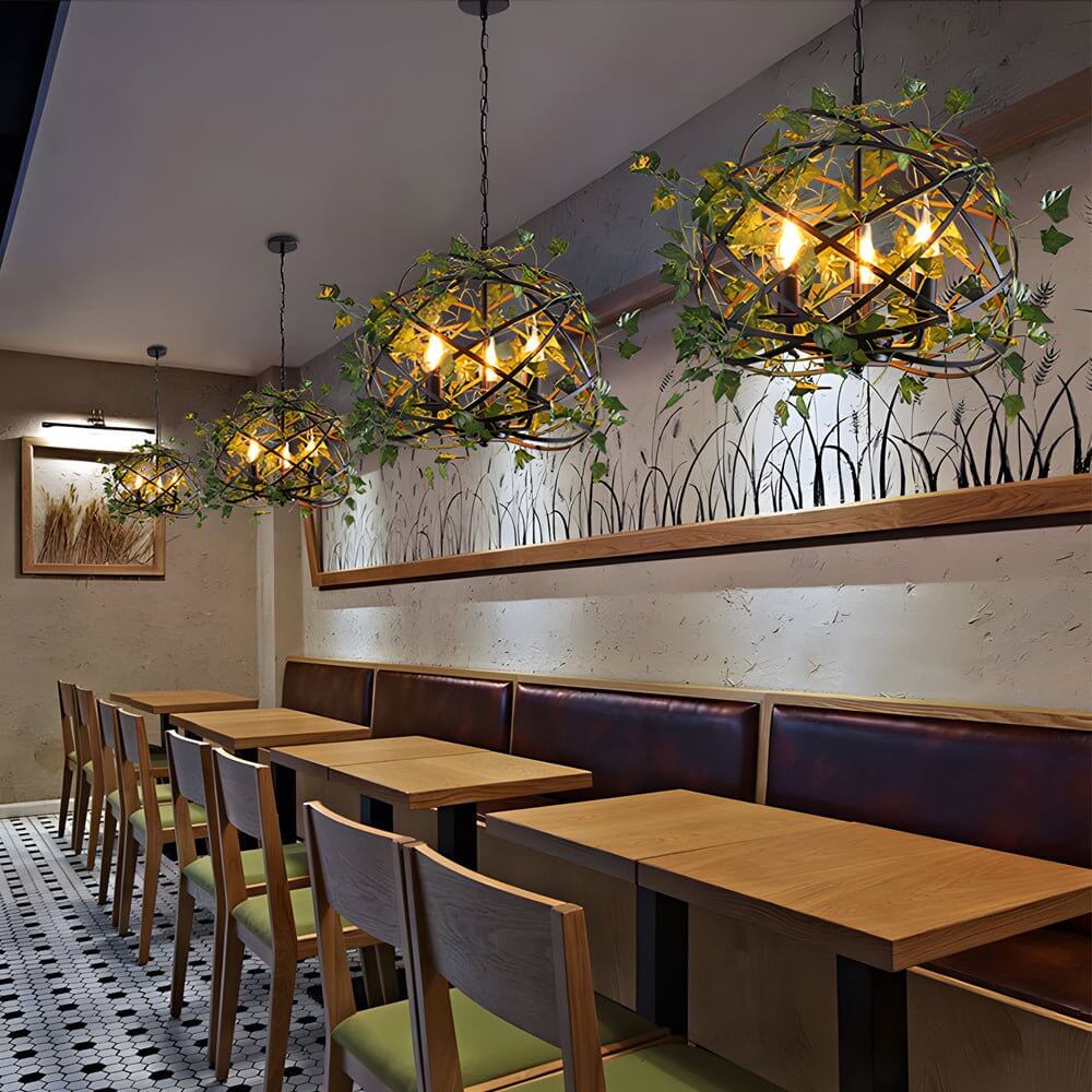 Aureon iron cage pendant light in a festive outdoor-inspired garden party interior setup