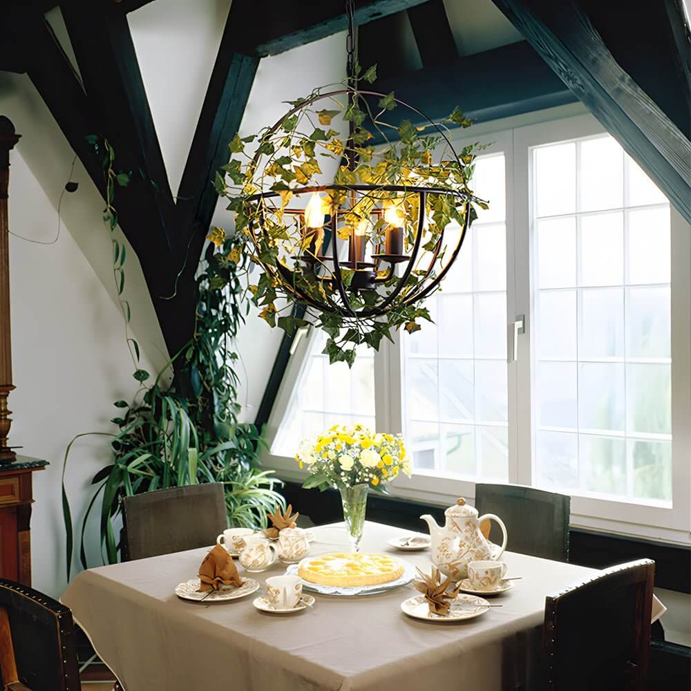 Aureon vine pendant light above a wooden farmhouse-style dining room table