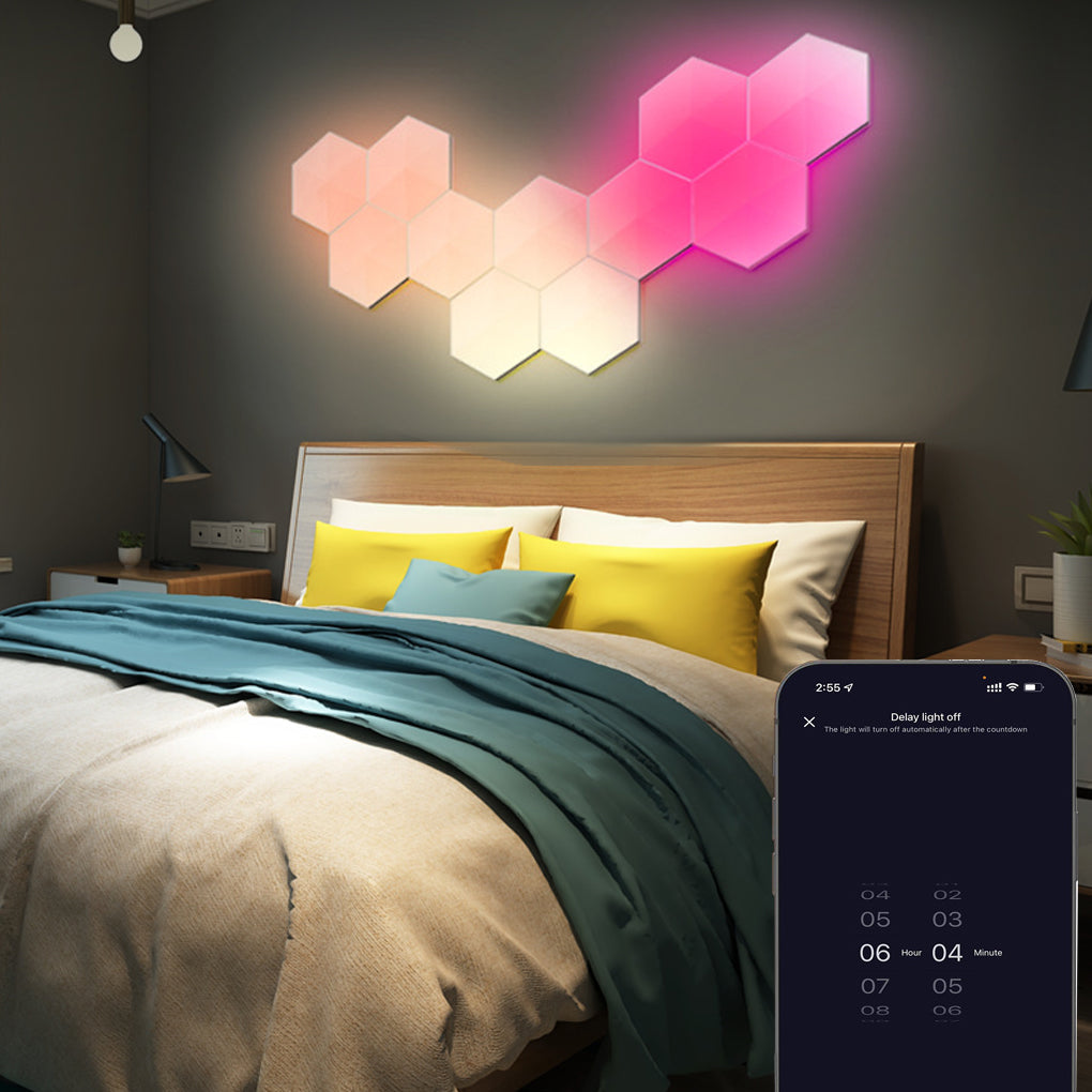 Hexagon smart LED wall light panels creating ambient colour in a bedroom