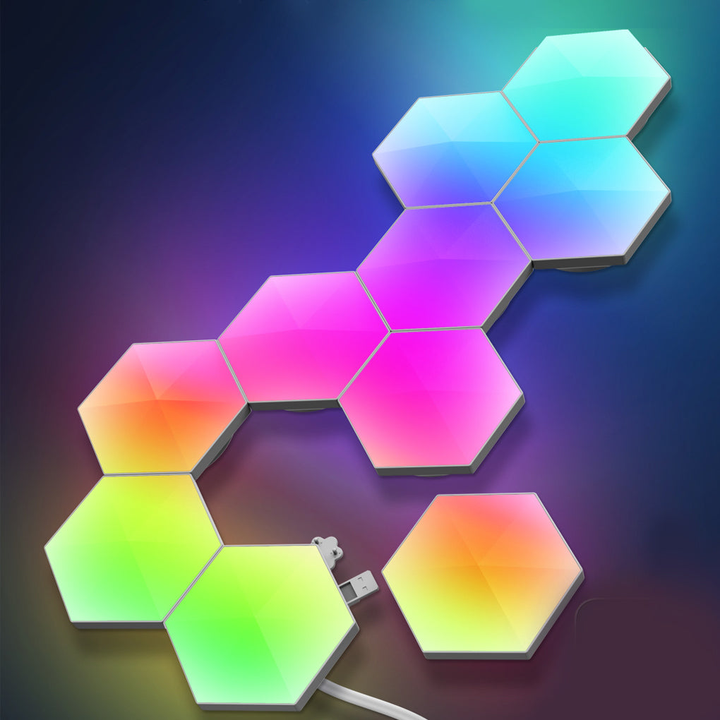 Close-up of RGBIC LED hexagon wall light panel showing multi-colour illumination