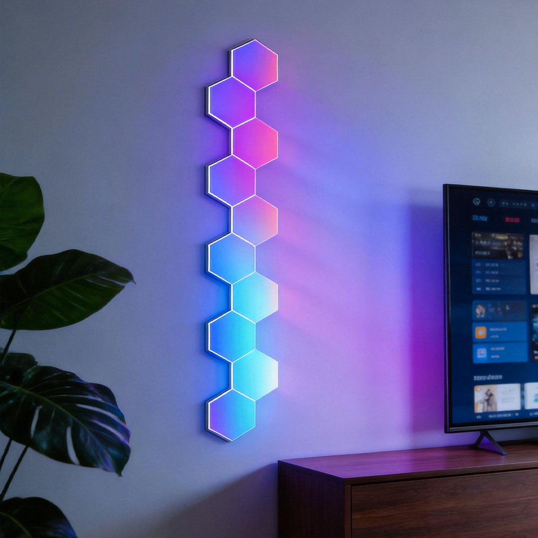 Vertical gradient colour display on modular hexagon LED wall light panels