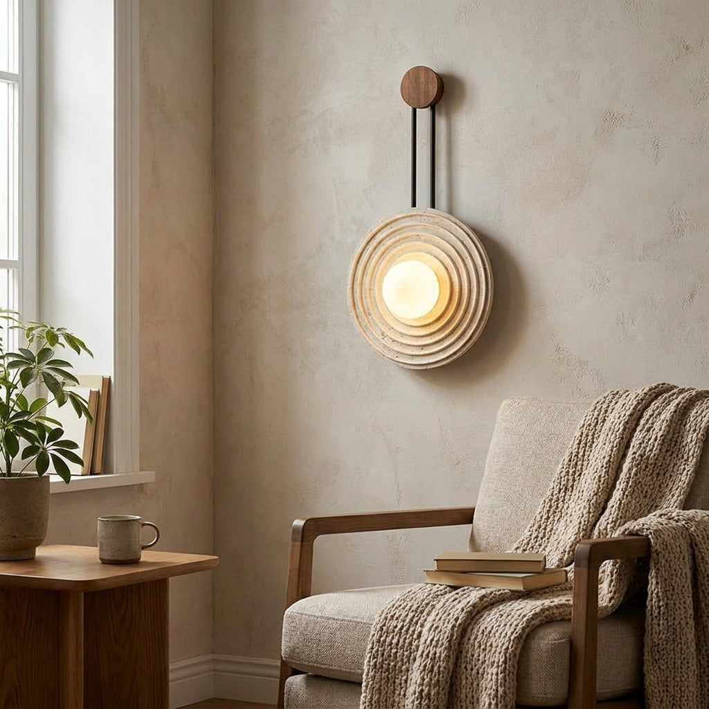 Rinko travertine wall light in a warm Japandi bedroom interior