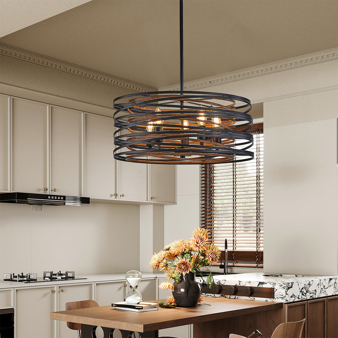 Aureon black drum pendant light above a home bar in a modern interior