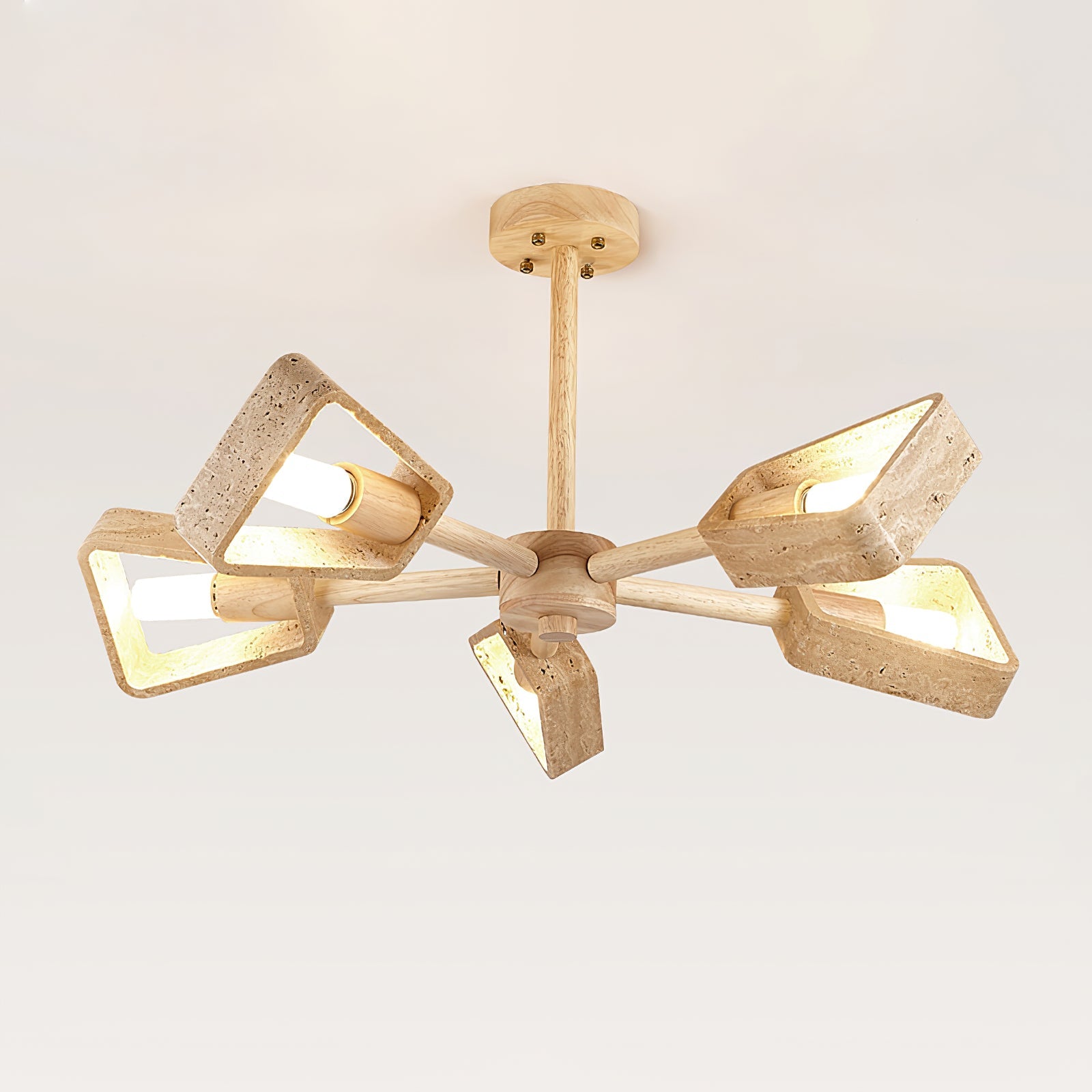 Natural yellow travertine chandelier in a warm, calm Japandi home dining room