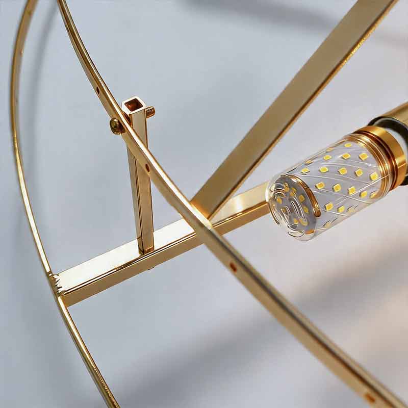 Interior view of the gold metal frame of the Auréline crystal drum chandelier