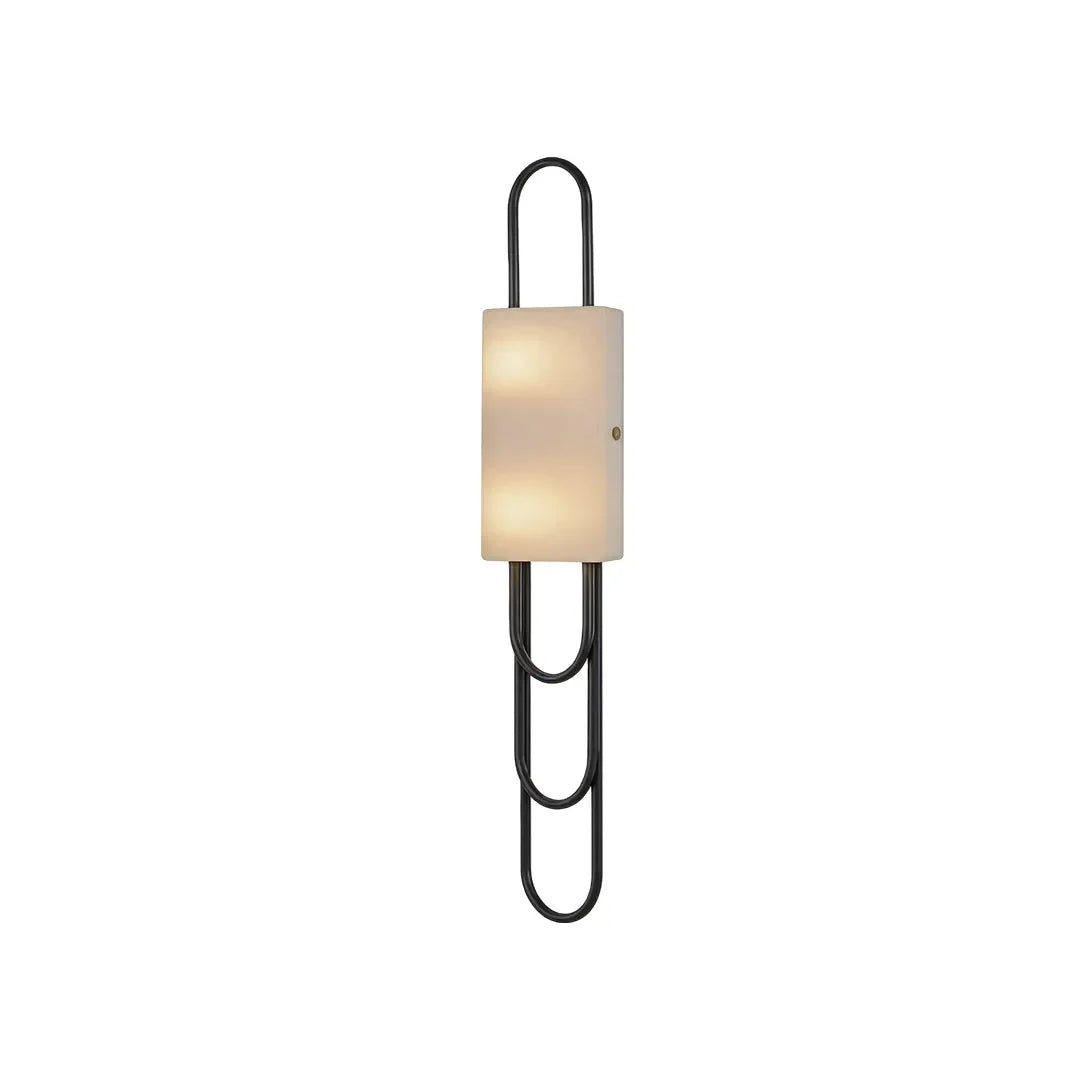 Niva marble wall sconce in black finish, slim vertical LED wall light against a white wall
