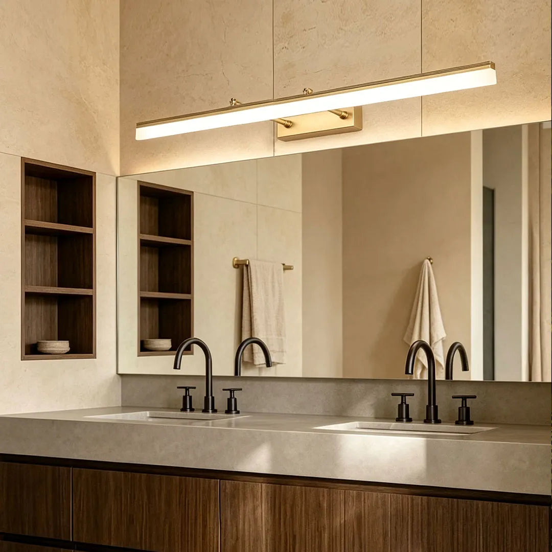 Linear gold bathroom vanity light bar above double vanity in modern bathroom