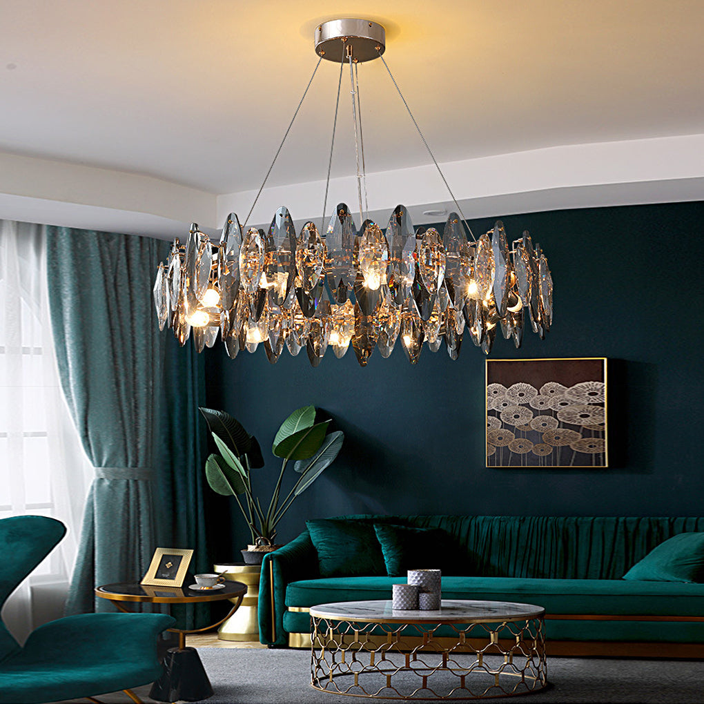 Luxury crystal chandelier with smoke grey glass shades in a dark green contemporary living room