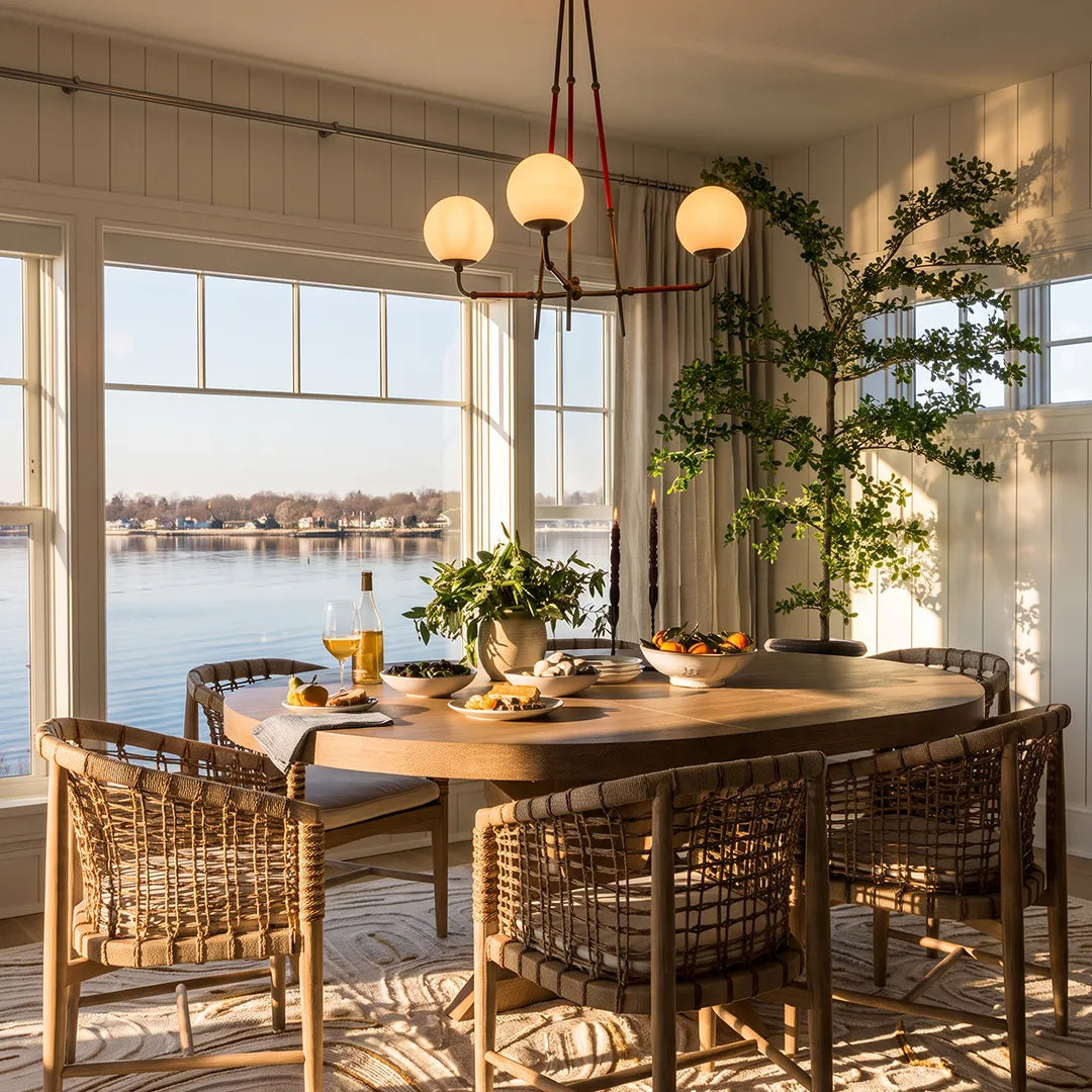 Auréline white glass shade chandelier in a bright modern breakfast room