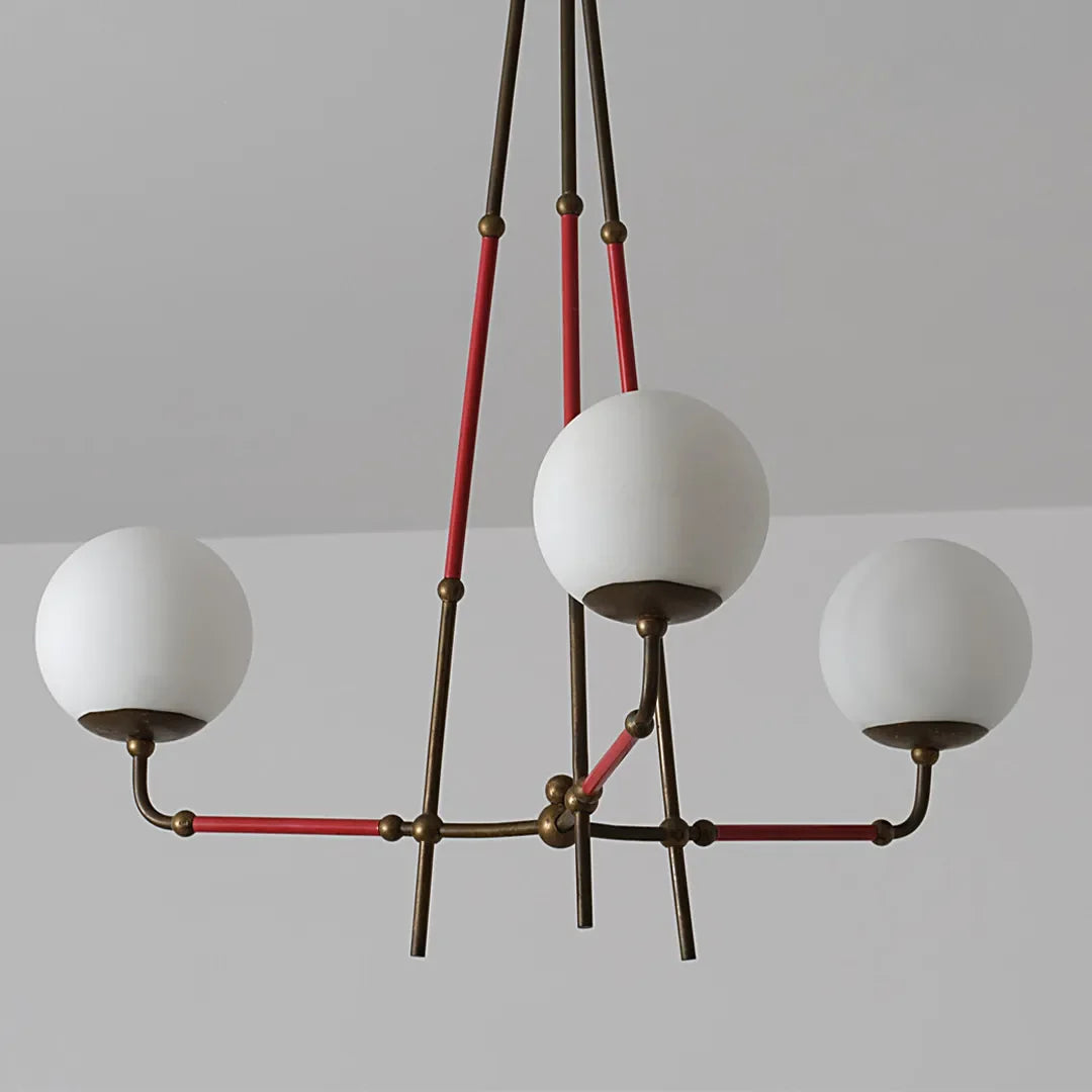 Close-up of Auréline antique copper iron frame and white glass shade detail