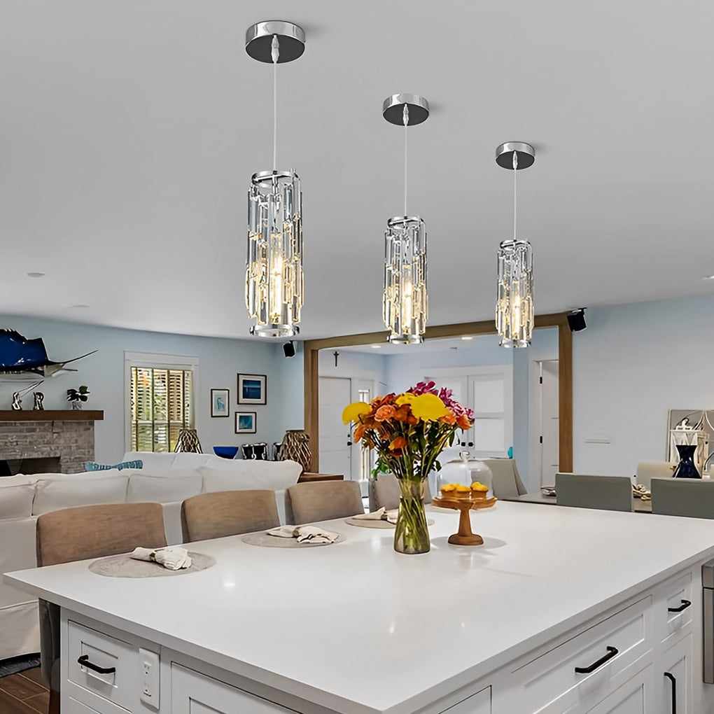 Mini crystal pendant lights above an open-plan kitchen in a modern home