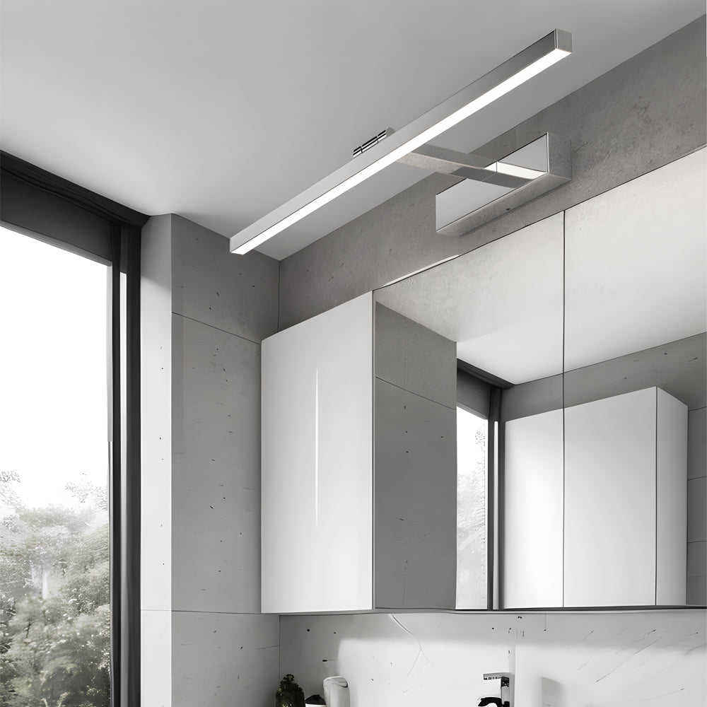 Viora LED vanity light bar above a bathroom mirror in a modern minimalist bathroom