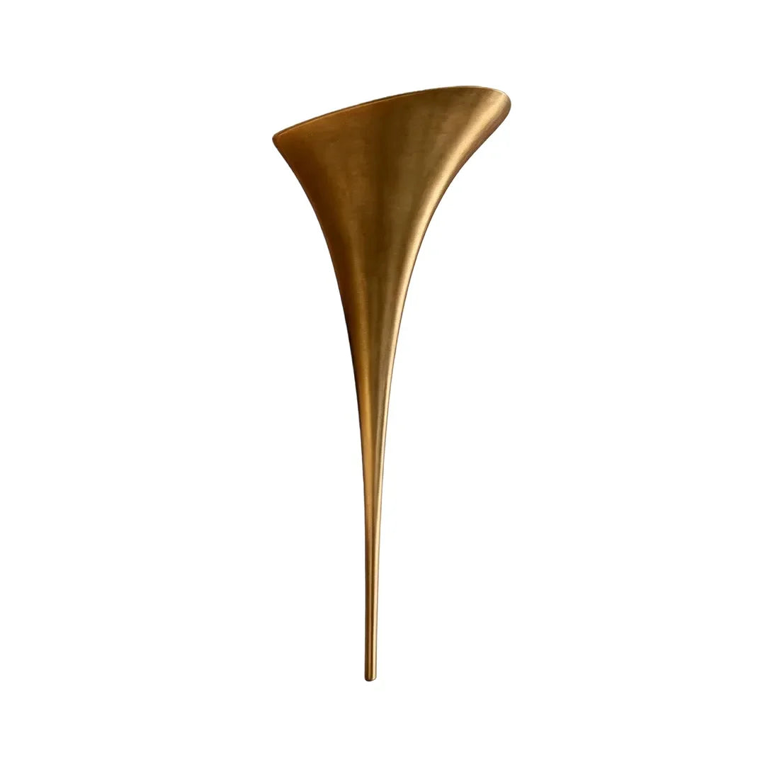 Modern brass wall sconce in gold finish, large size, flared uplighter on white wall