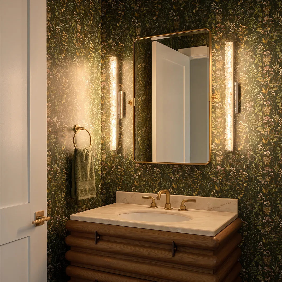 Niva crystal wall light flanking a bathroom mirror as a vanity sconce