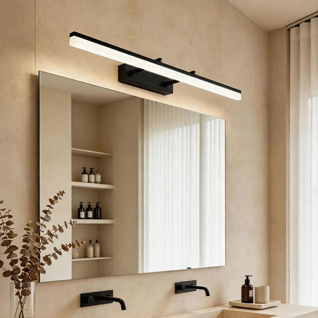 Modern gold LED bathroom vanity light in beige bathroom interior