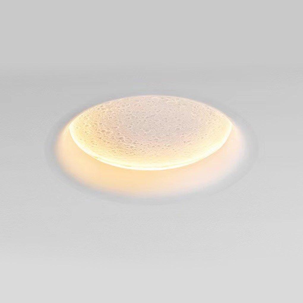Alure circular plaster LED sconce installed in a contemporary hallway niche