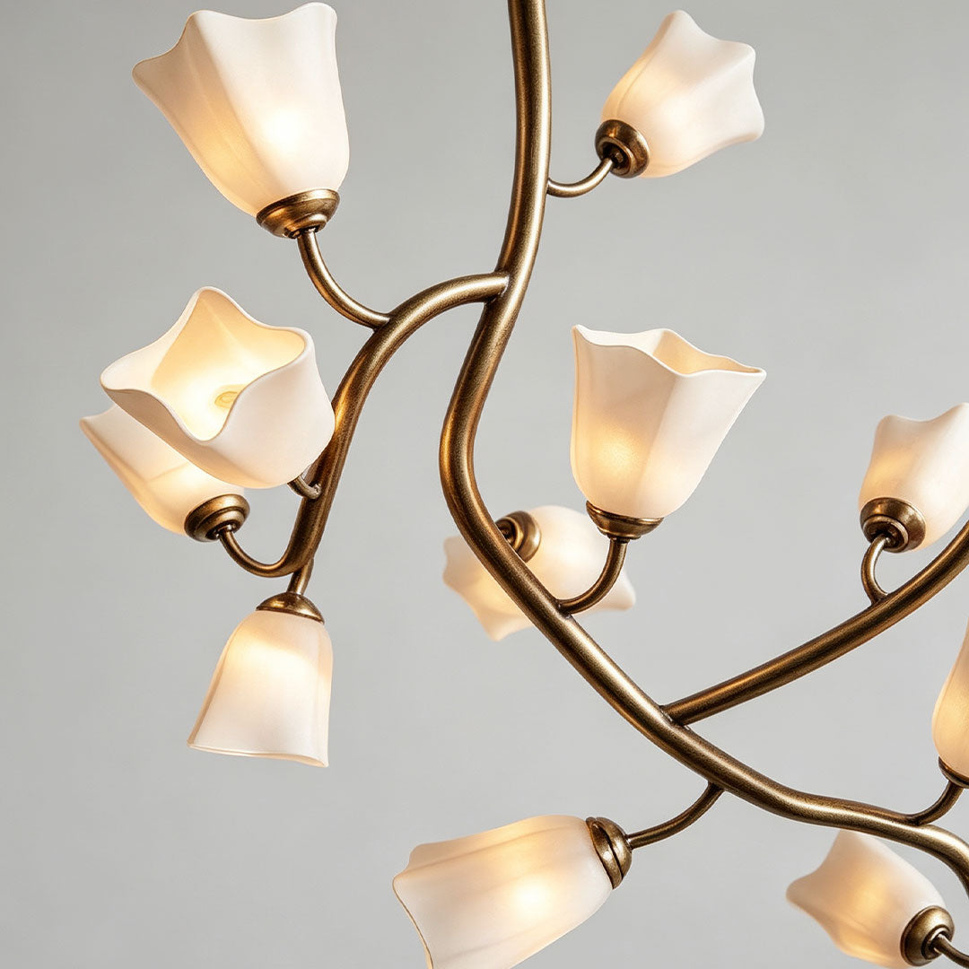 Close-up detail of glass shades on the Auréline lily branch chandelier