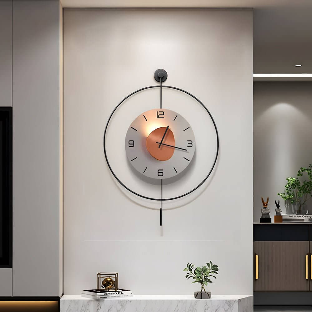 Alure abstract art LED wall clock on a neutral wall above a gray sofa in a contemporary living room