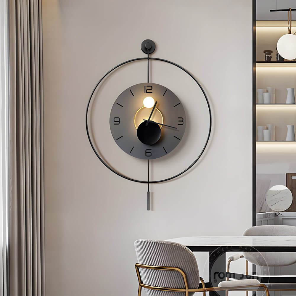 Alure LED wall clock with backlit abstract panel in a modern kitchen with white cabinets and dining table