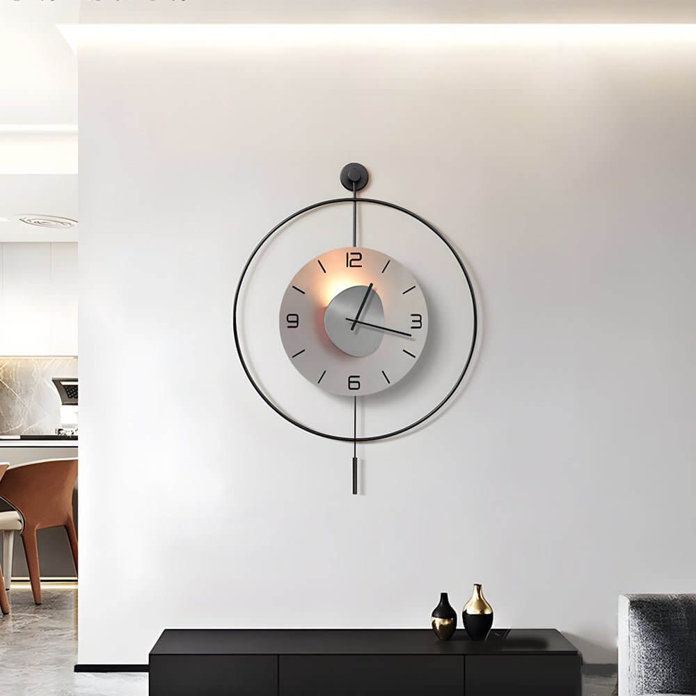 Alure LED wall clock with warm halo backlight against a neutral wall