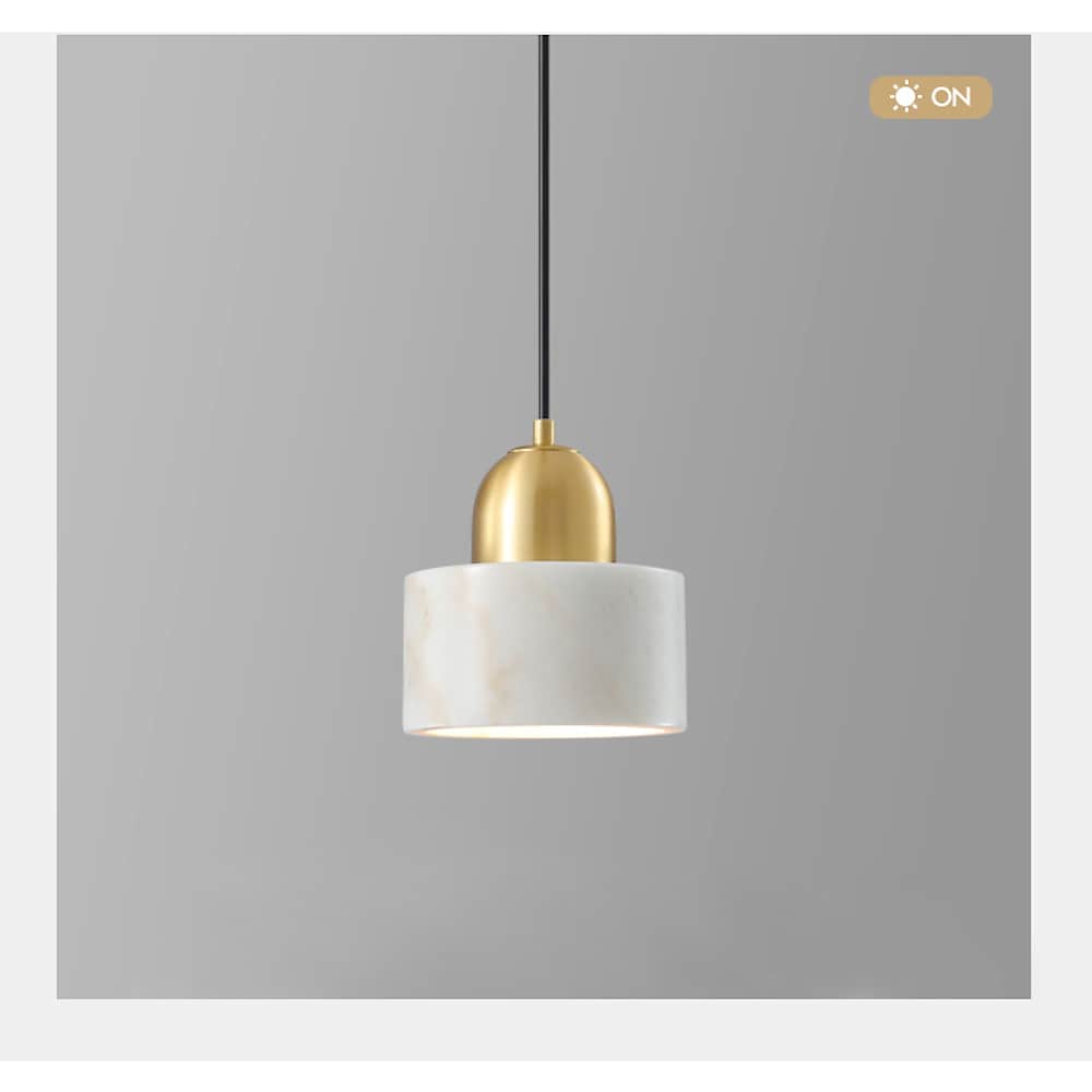 Aureon mini pendant light with marble shade in white, above a kitchen island