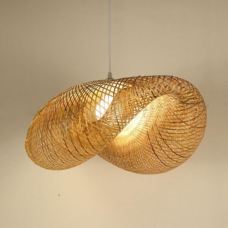 Aureon rattan pendant light shown in an indoor display setting