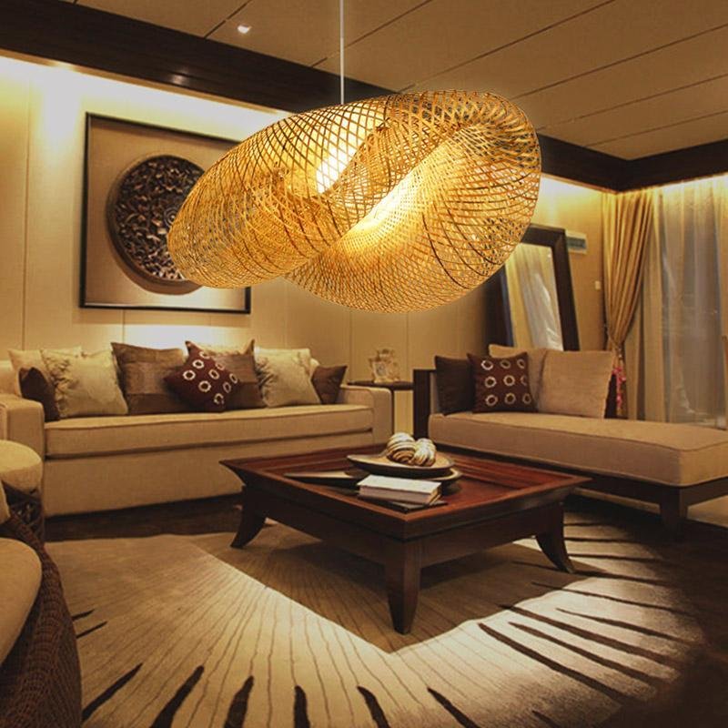 Aureon rattan wave pendant light hanging in a modern living room