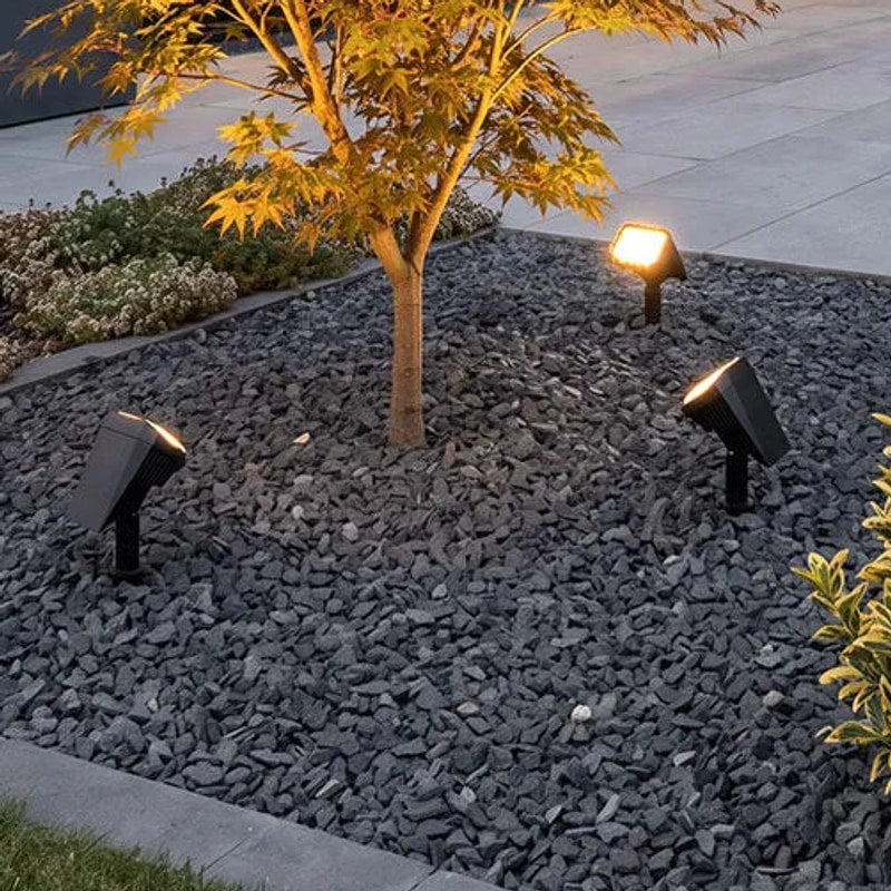 Close-up of Solvara solar stake light showing 180-degree adjustable head and black finish