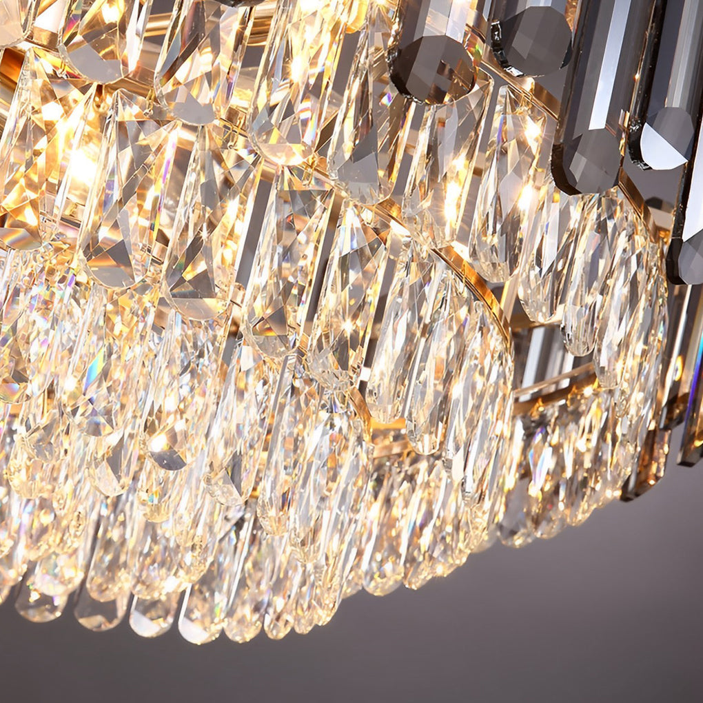 Auréline crystal chandelier with soft warm glow in a luxurious bedroom setting