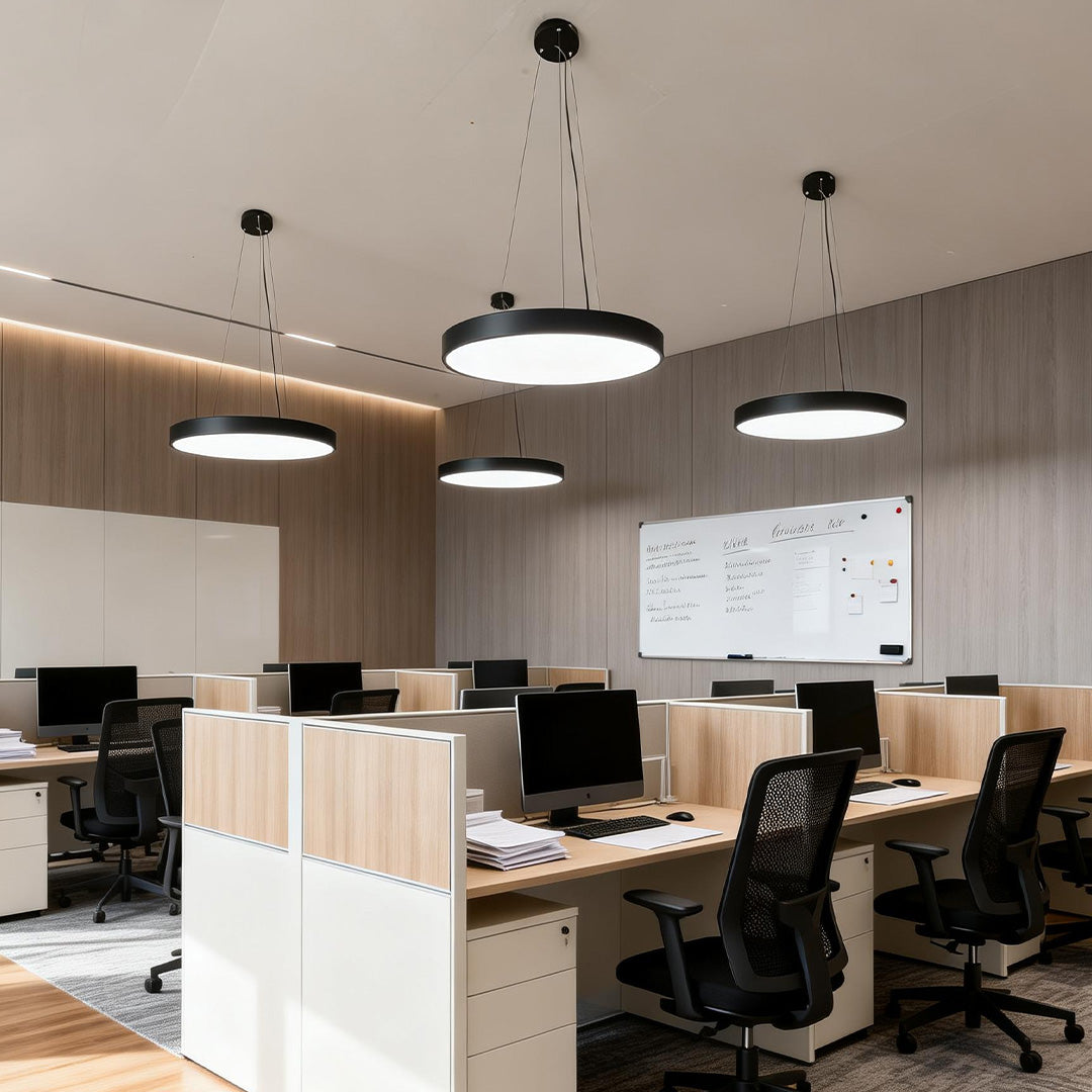 Round ceiling pendant lights in a collaborative commercial workspace