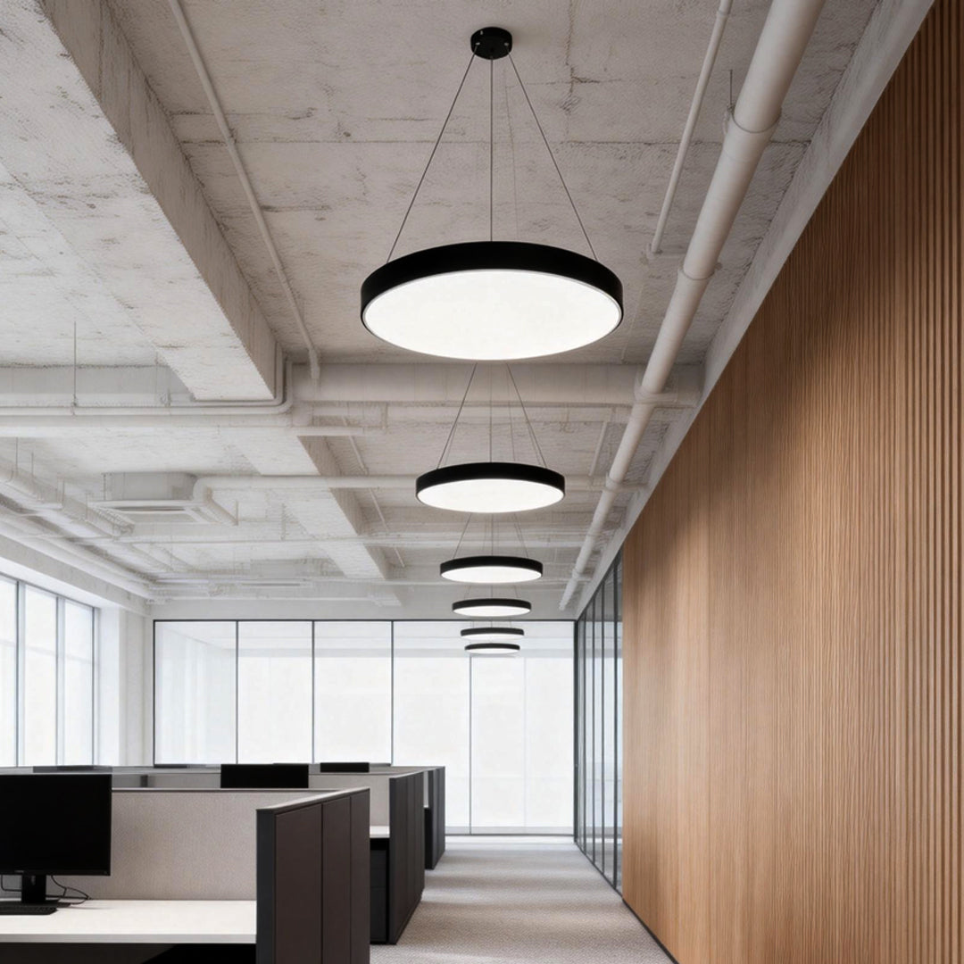 Aureon round LED ring pendant light in a modern hallway interior, black finish