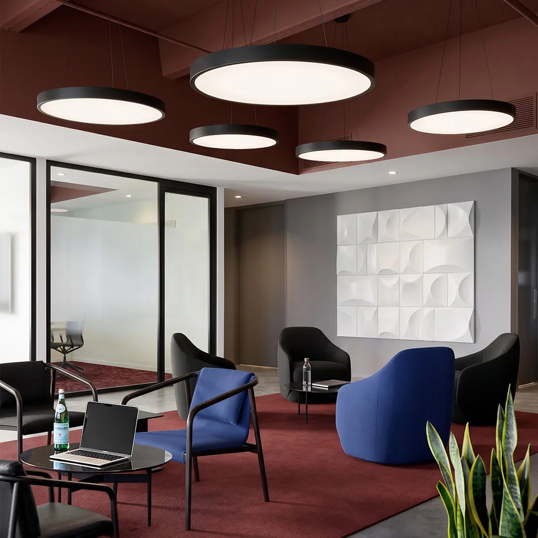 Round iron ring pendant light in a modern commercial lounge