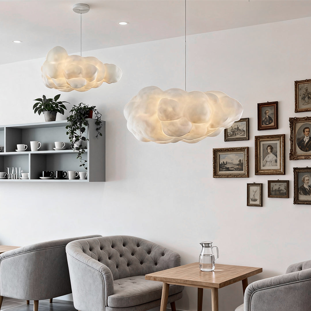Rounded cloud pendant light with warm LED glow in a living room setting