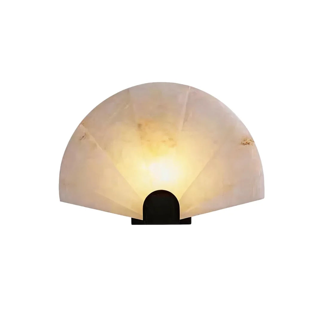 Small Niva scalloped marble wall sconce with fan-shaped white marble shade on a clean background