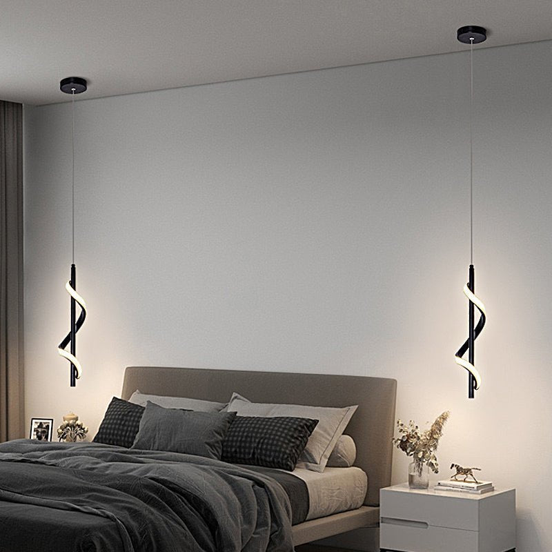 Aureon spiral LED black pendant light hanging in a modern living room interior