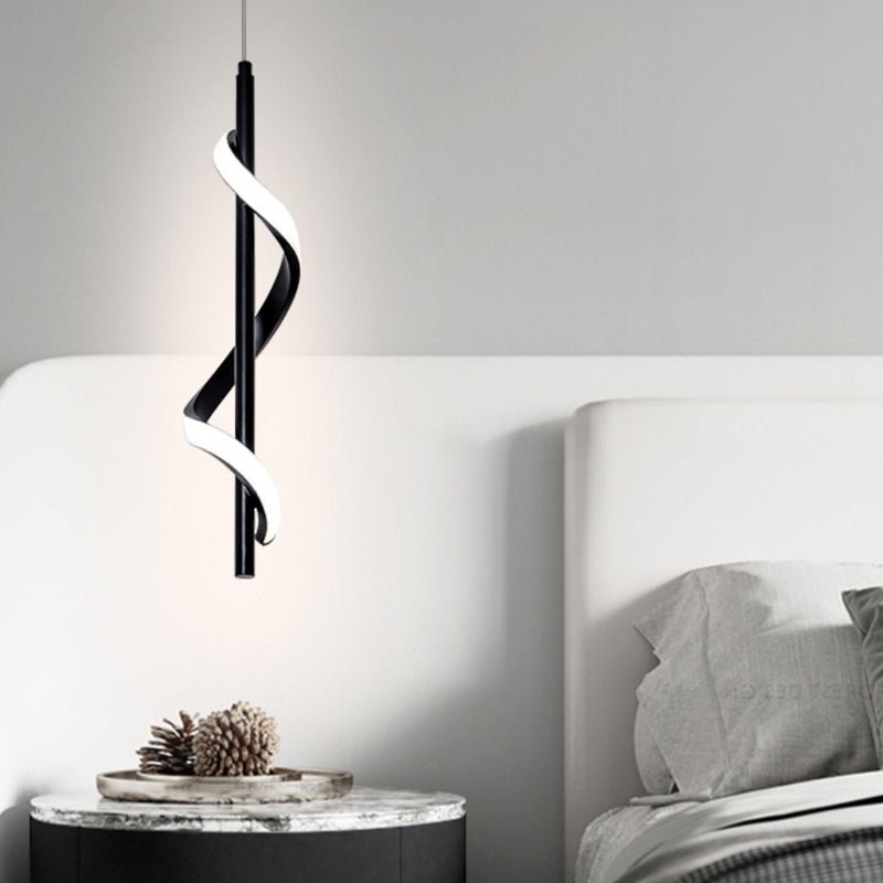 Aureon black wall lamp with spiral strip design mounted in a contemporary bedroom