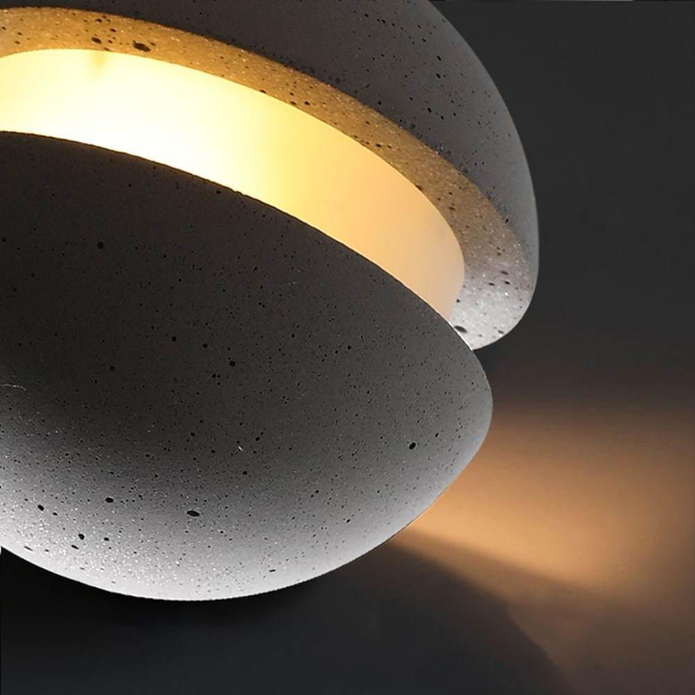 Aureon ceramic pendant light showing adjustable cord and ceiling canopy detail