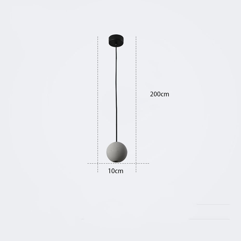 Aureon ceramic globe pendant light with cement-finished shade in a modern dining room