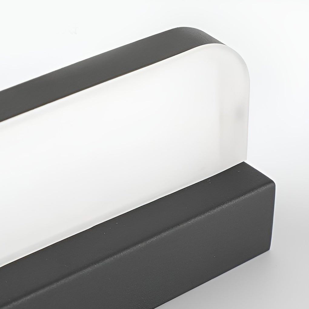 Warm white LED illumination from the Viora vanity bar light reflected in a bathroom mirror