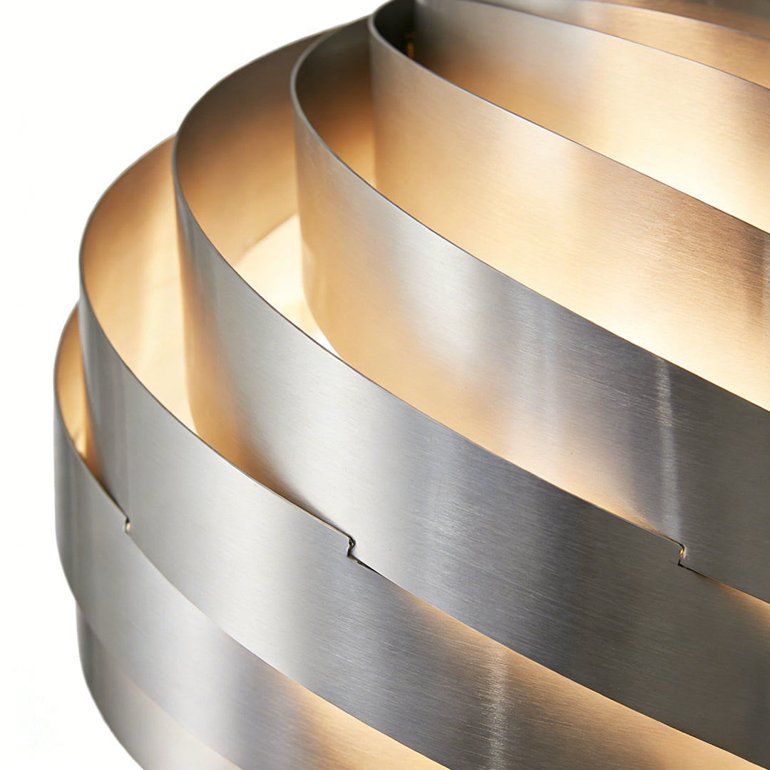 Aureon swirl pendant light viewed from an angle, showing the layered spiral aluminium design