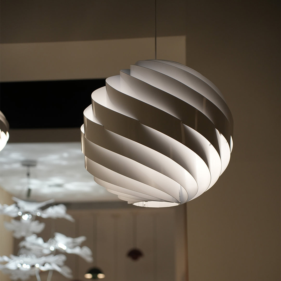 Aureon swirl pendant light in a home interior, contemporary aluminium ceiling light