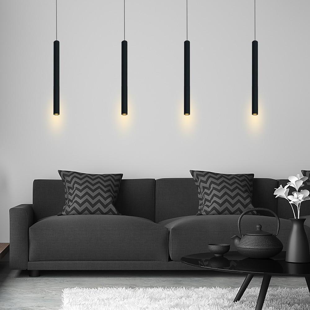 Aureon cylinder pendant light in black, close-up showing aluminum body and acrylic shade