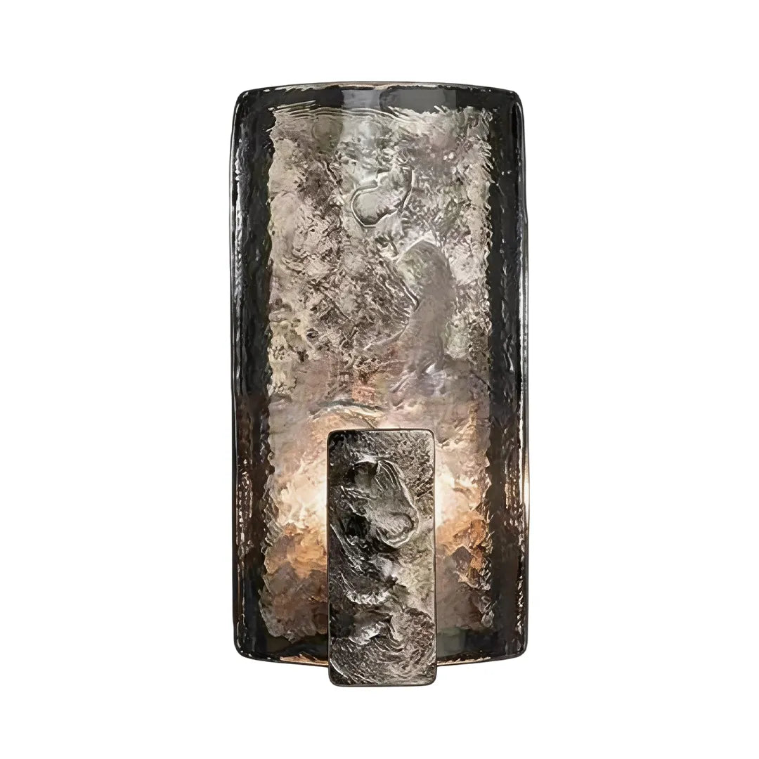 Niva wall sconce in dark antique bronze finish mounted on an interior wall