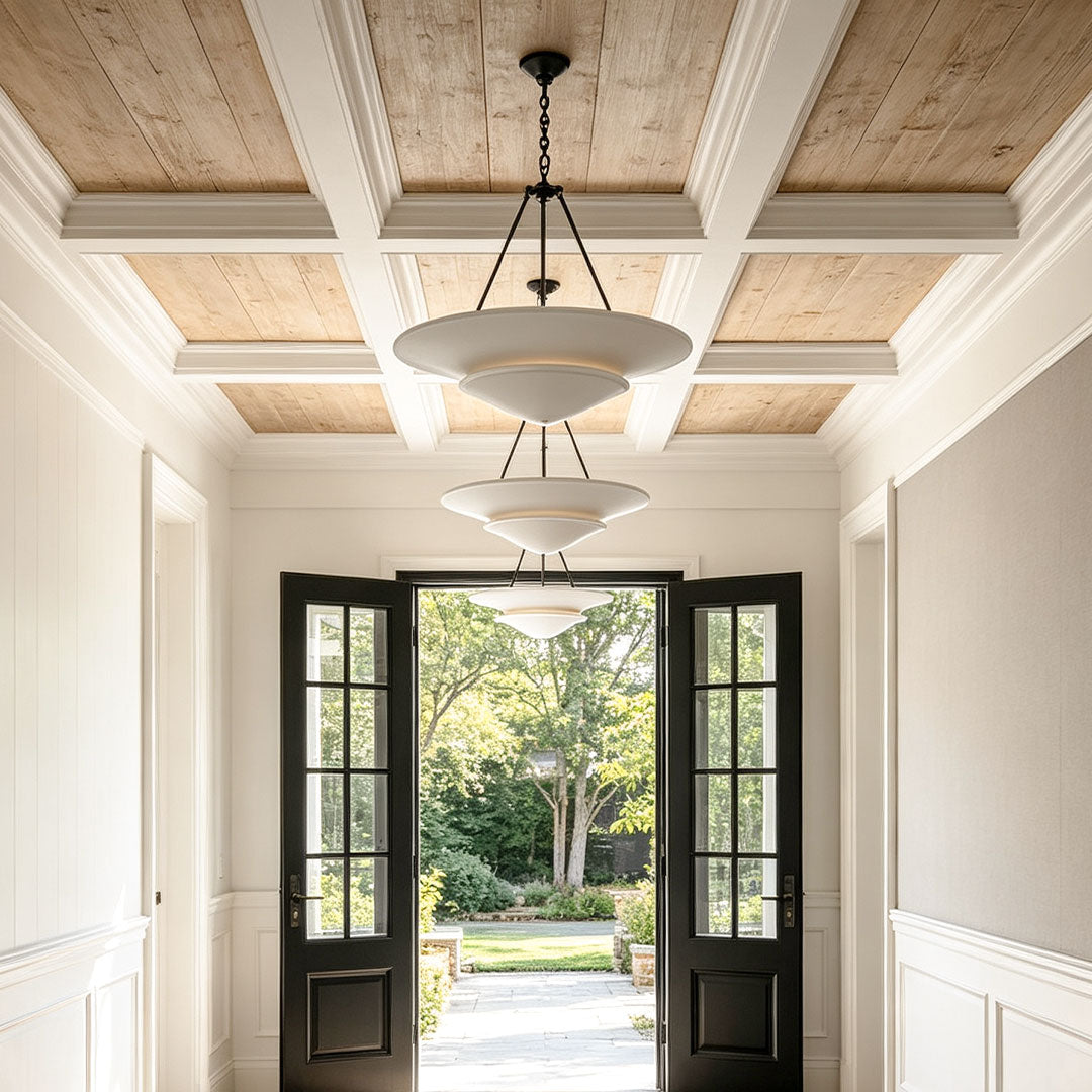 White plaster chandelier in a contemporary hallway lighting design