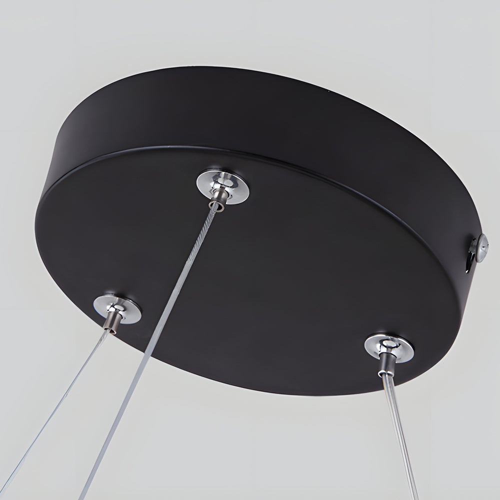 Close-up of Y-shaped linear pendant light canopy and cable suspension detail